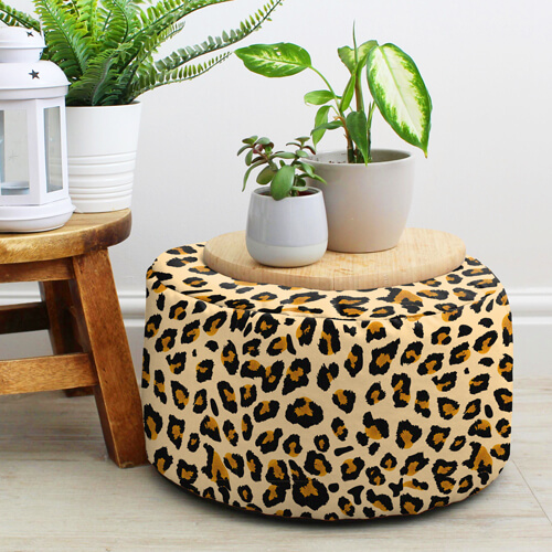 Leopard foot stool used as footstool