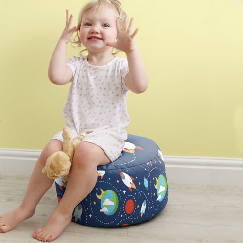 Outer Space Kids Beanbag Stool used as a seat